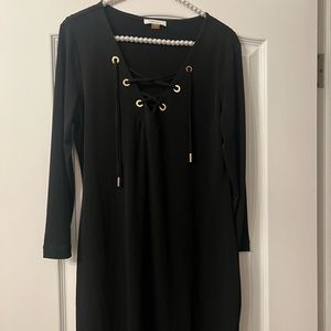 Calvin Klein black dress . Never worn. Size 10.